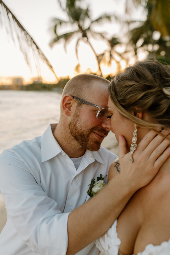 Bride and groom portraits at destination wedding on the beach in Playa del Carmen, Mexico